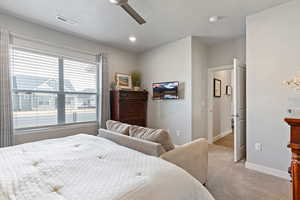 Bedroom with carpet flooring, a ceiling fan, recessed lighting, and a textured ceiling