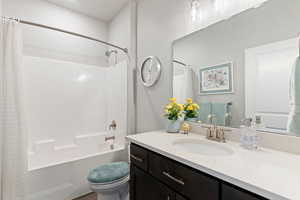 Full bathroom with vanity and shower / bath combo