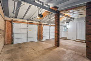 Garage featuring a garage door opener