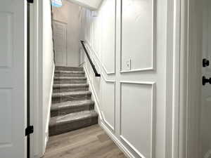 Stairway with wood finished floors