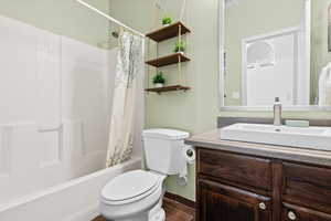 Full bathroom featuring vanity and shower / bath combo