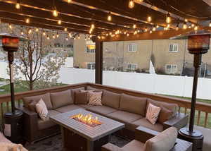 Backyard deck with an aluminum pergola