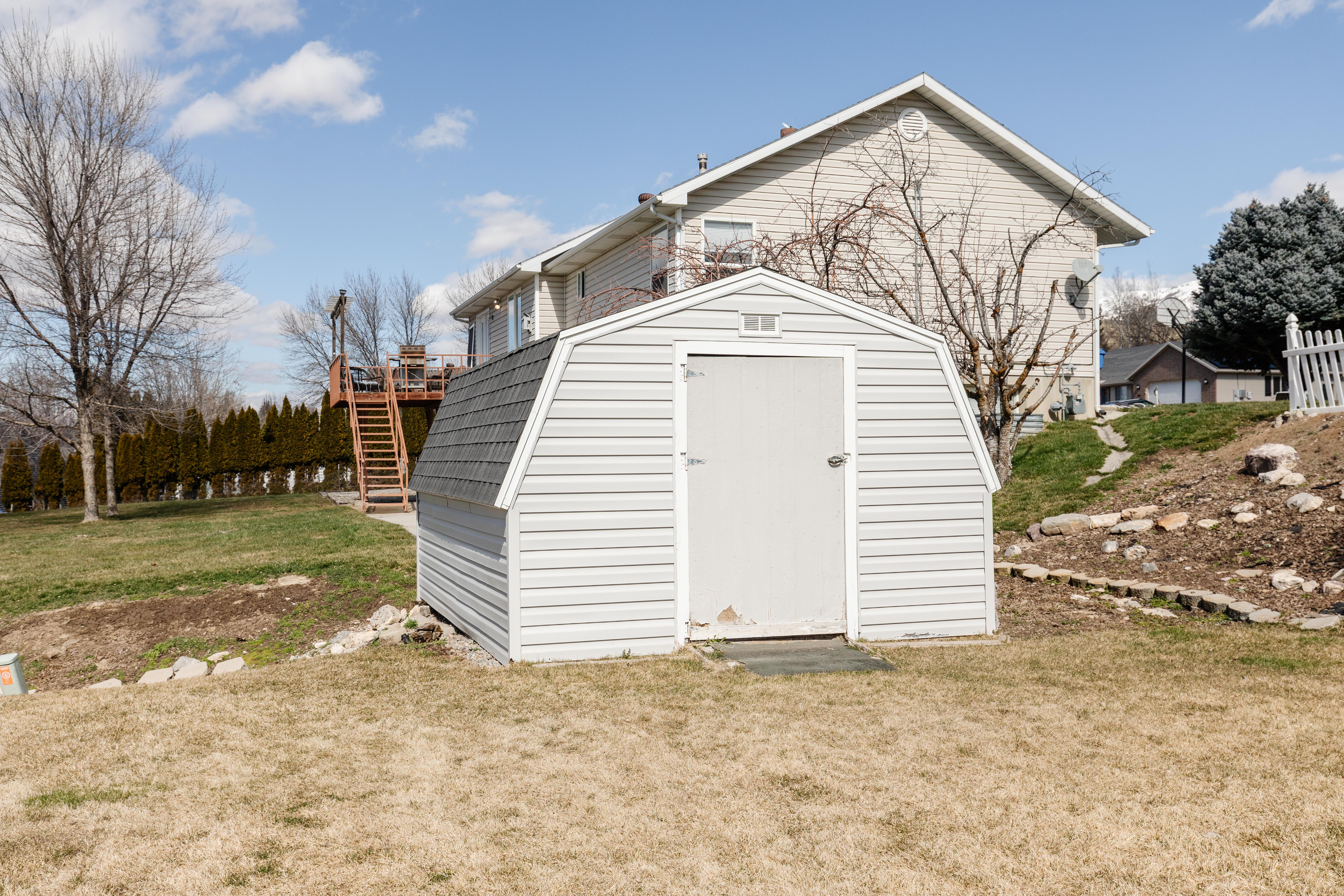 View of shed featuring stairs