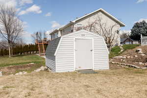 View of shed featuring stairs