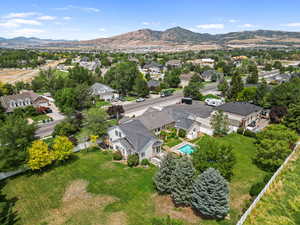 Aerial view of residential area with a mountainous background