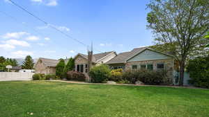 Ranch-style home with brick siding
