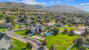 Aerial perspective of suburban area with a mountain backdrop