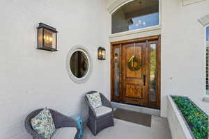 Property entrance with brick siding