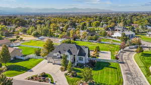 Aerial view of residential area with a mountainous background