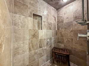 Bathroom with a tile shower
