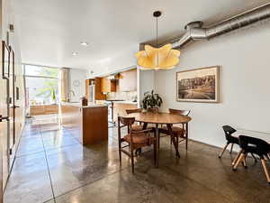 Dining room with finished concrete floors