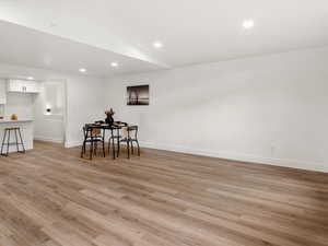 Dining room featuring recessed lighting and light wood finished floors