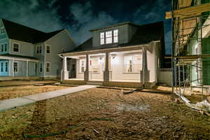 View of front of property with a porch