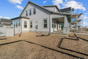 Back of house with a patio