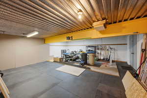 Storage / gym room below garage