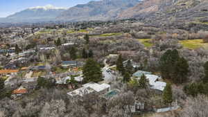 Aerial view of residential area featuring a mountain backdrop