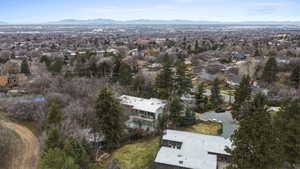 Aerial view of property's location with a mountain backdrop