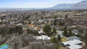 Aerial view of residential area featuring mountains