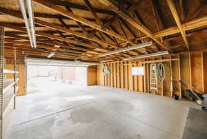 Garage featuring electric panel