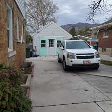 Exterior space with a mountain view and driveway