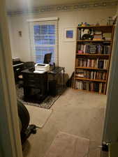 Office with light colored carpet