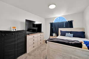 View of carpeted bedroom