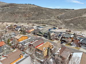 Aerial view of residential area featuring mountains