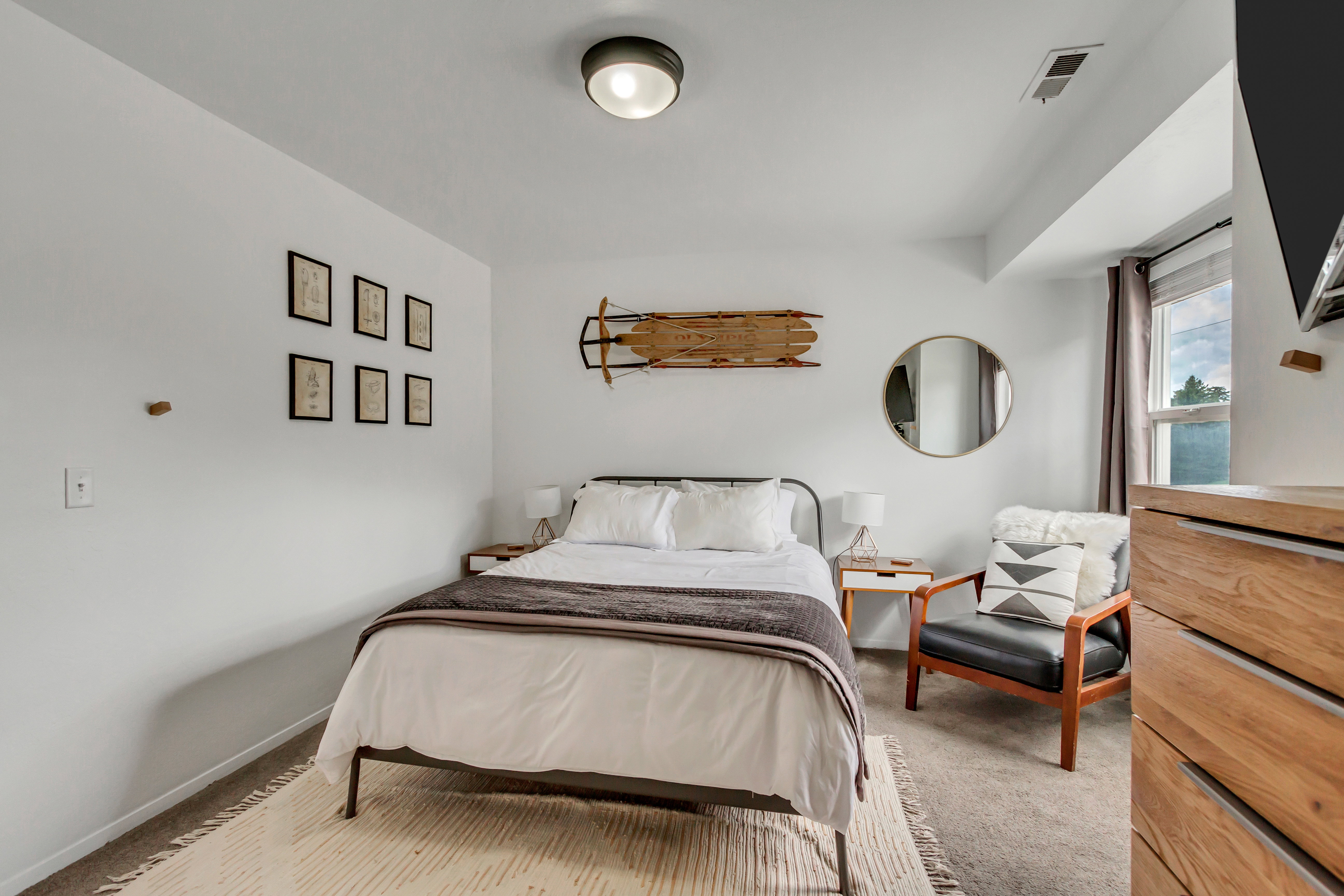 Bedroom with light carpet