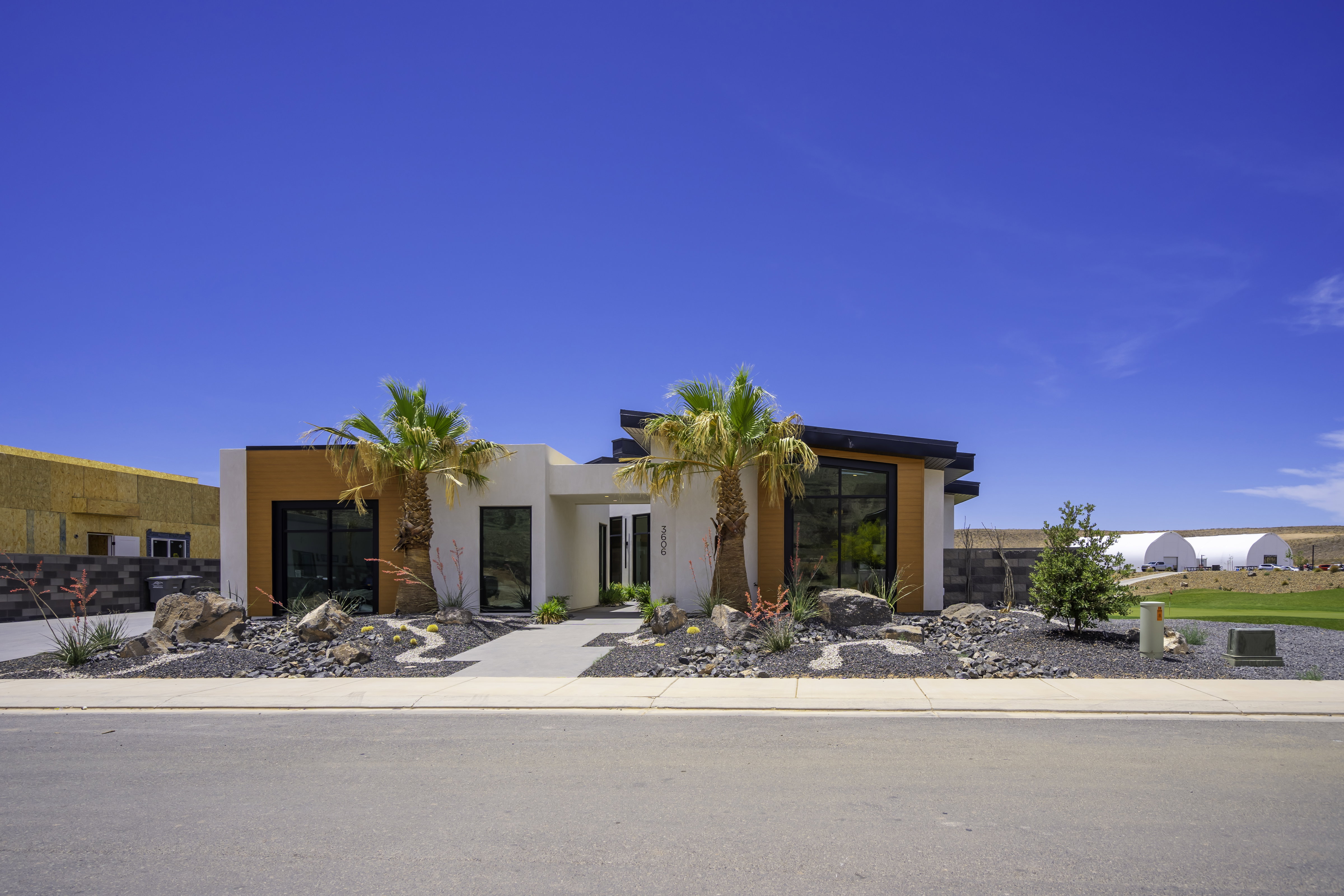 Modern home featuring stucco siding