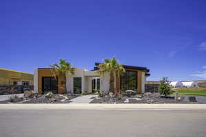 Modern home featuring stucco siding