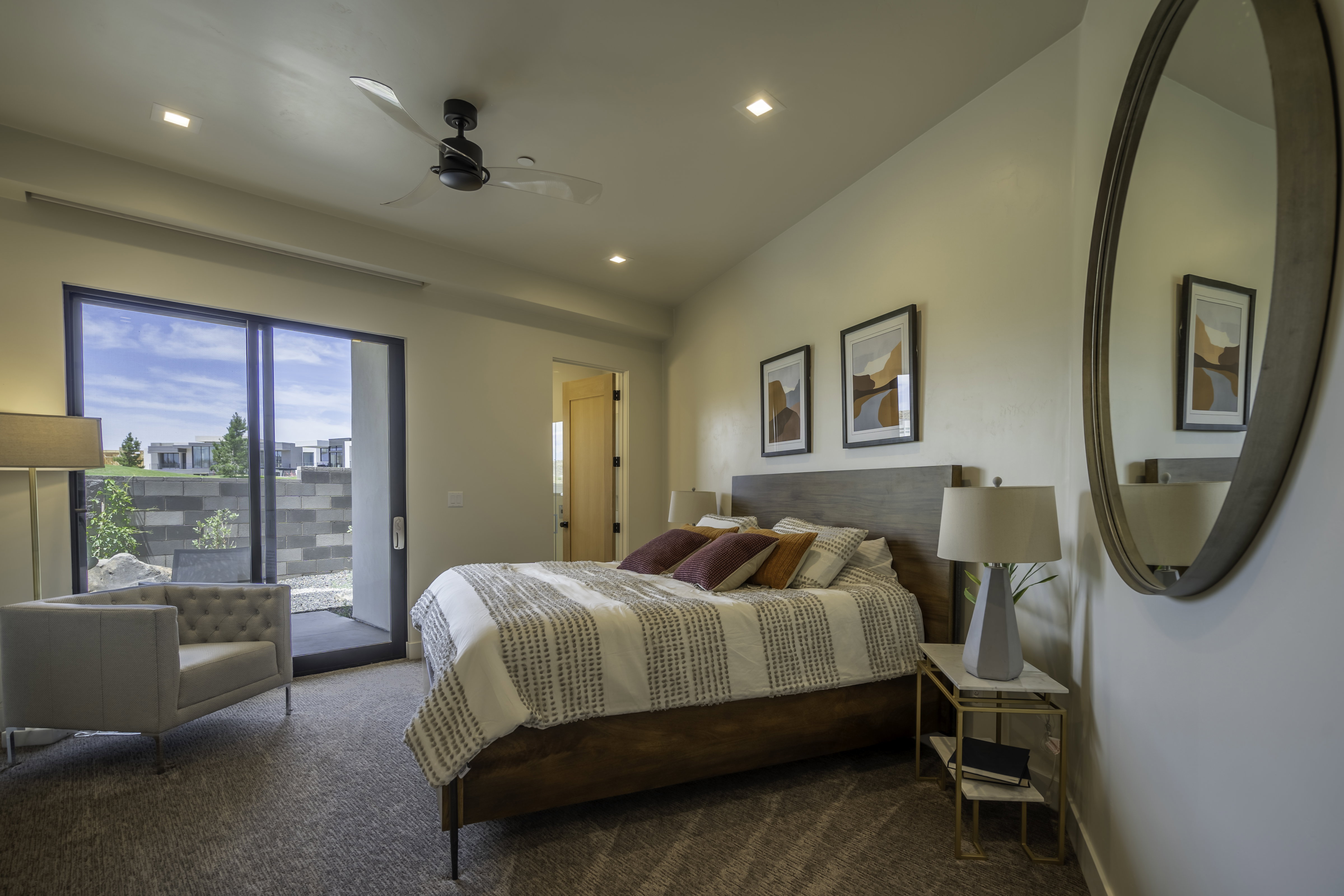 Carpeted bedroom featuring access to exterior, ceiling fan, and recessed lighting