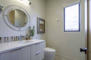 Full bathroom featuring vanity and light tile patterned floors