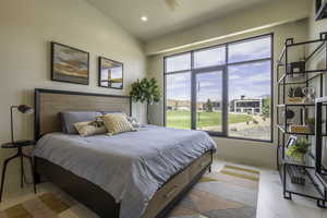 Bedroom featuring ceiling fan, lofted ceiling, and recessed lighting