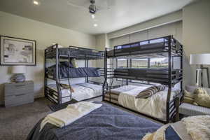 Bedroom featuring carpet flooring, ceiling fan, and recessed lighting