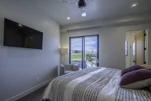 Carpeted bedroom with a ceiling fan, access to outside, and recessed lighting