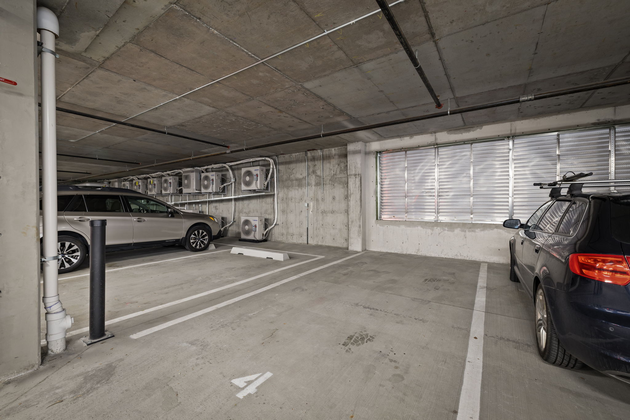 Garage featuring a parking deck