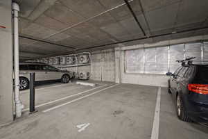 Garage featuring a parking deck