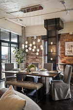 Dining room with brick wall