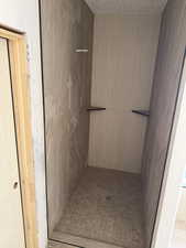 Full bath featuring a stall shower