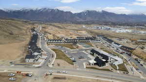 Aerial overview of property's location with a mountainous background