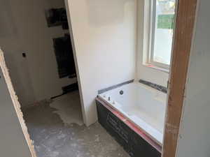 Full bath with a bath