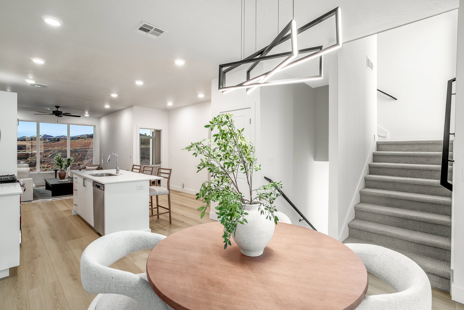 Dining space with ceiling fan, recessed lighting, light wood-type flooring, and a mountain view