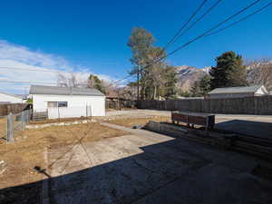 View of fenced backyard