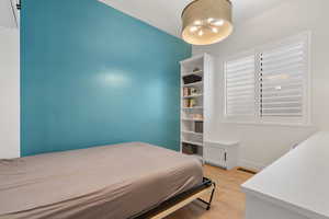 Bedroom 3 (Main Level) Built Ins make it a great secondary office, craft room, hobby room. Guest bedrooom...has its own murphy bed!!