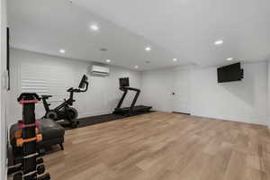 Expansive Gym Room in the basement. Can lights. Large mirrors. Could be turned into a 4th bedroom again pretty easily! Access to 'good sized' under the porch storage.