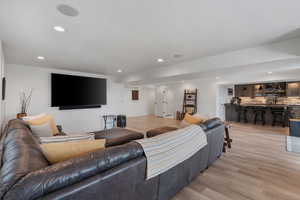 High end solid surface flooring. Can lights. Large windows. Massive vinyl window slider leading out to expansive entertaining deck.