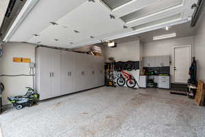 Custom Built out garage. Work Bench. Deep storage closets. Bike storage system. Epoxied Floors.