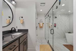 Lovely Spa/Resort Style Full Bath!! Multiple shower heads! Marble Tile! Relax after a long day or hitting it hard in the home gym!!!