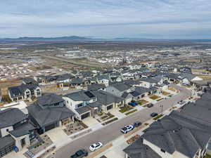 Aerial view of the neighborhood and views or the Great Salt Lake, Mtns, and valley.  Secluded area.