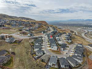 Aerial view of the neighborhood and views or the Great Salt Lake, Mtns, and valley.  Secluded area.